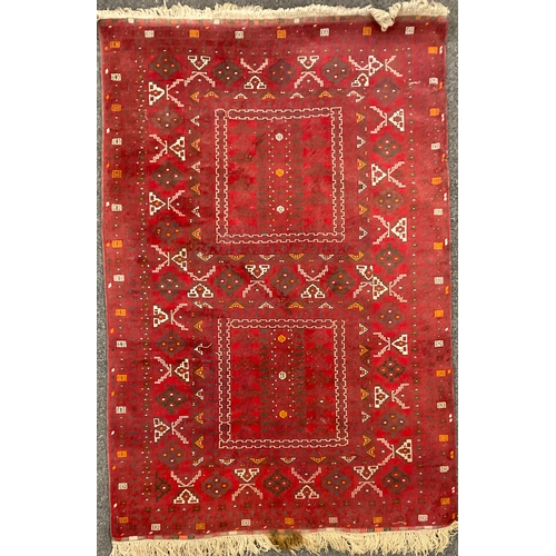 212 - A Turkaman Rug, hand-knotted, tones of red, grey, yellow, and white, 240cm x 165cm.