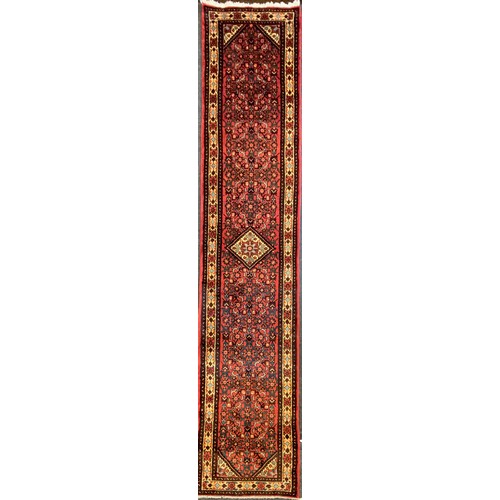 234 - A North West Persian Malayer Runner carpet, hand-knotted, 400cm x 80cm.