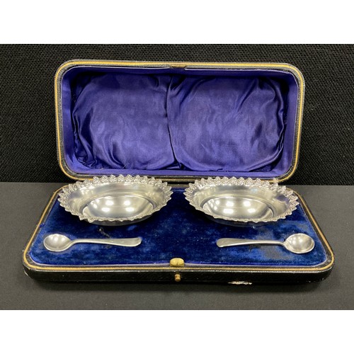 276 - A pair of Edwardian silver oval table condiment bowls, Thomas Lawrence, Sheffield 1905, one with ass... 