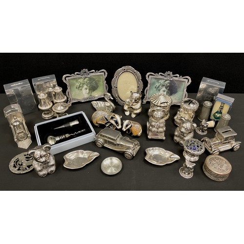 277 - A modern novelty silver plated money bank, as a Motorcar, others, Teddy bears, Train, carousel, etc;... 