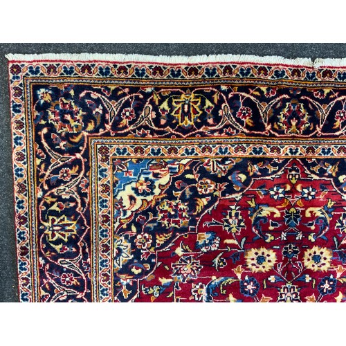 137 - A Central Persian Kashan Rug, hand-knotted with a central diamond-shaped medallion, within a densely... 