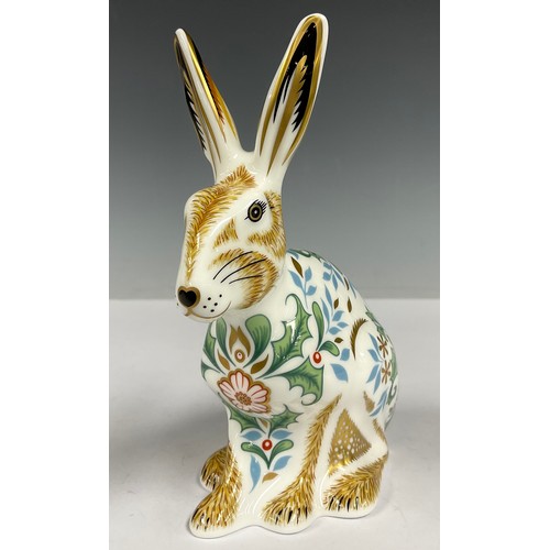 16 - A Royal Crown Derby paperweight, Winter Hare, 13cm high, printed marks in grey, gold stopper