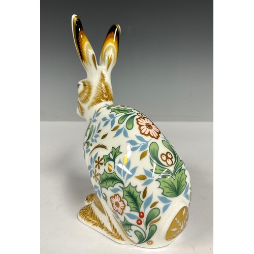 16 - A Royal Crown Derby paperweight, Winter Hare, 13cm high, printed marks in grey, gold stopper