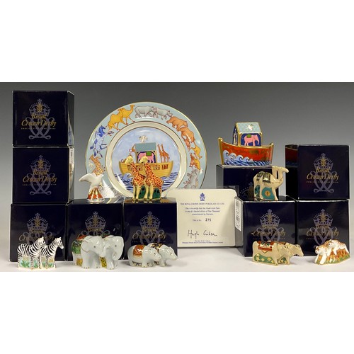 101 - A Royal Crown Derby model, Noah's Ark, boxed; a collection of eight Royal Crown Derby miniature anim... 