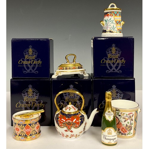 102 - A Royal Crown Derby miniature model, Toy Drum, first quality, boxed; others, Champagne Bottle and Ic... 