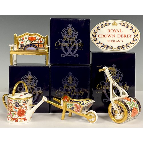 103 - A Royal Crown Derby miniature model, Garden Bench, Pardoe pattern, first quality, boxed; others, Wat... 