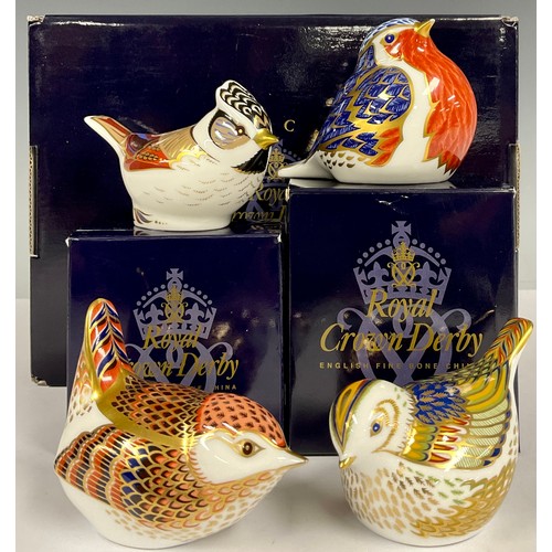 104 - A Royal Crown Derby paperweight, Robin, date code for 2004 (MMIV), gold stopper; others, Firecrest, ... 