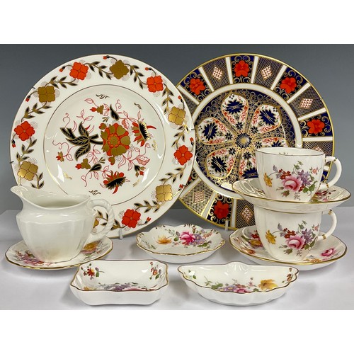 106 - A Royal Crown Derby Imari 1128 pattern dinner plate, 26cm diameter, second quality; another similar,... 