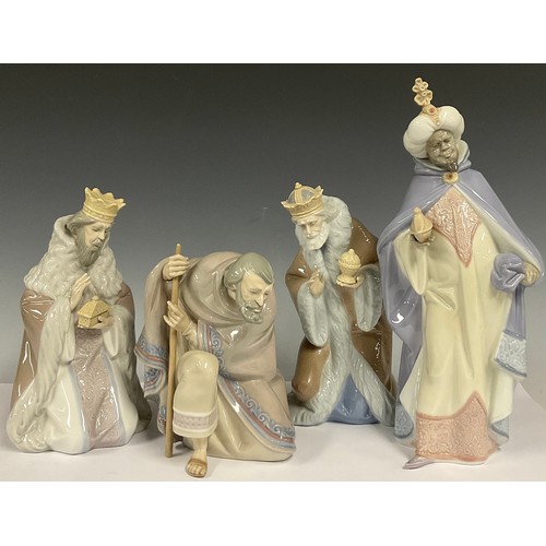 108 - A set of four Lladro Nativity figures, Joseph, King Balthasar, King Melchior and King Gaspar, the ta... 