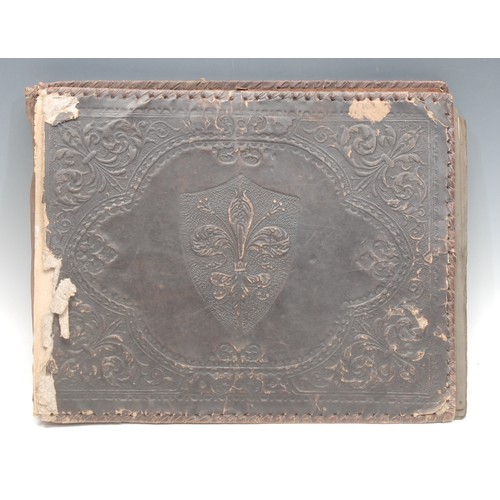 704 - A 19th century Florentine leather-bound photograph album, embossed with fleur-de-lis, containing 19t... 