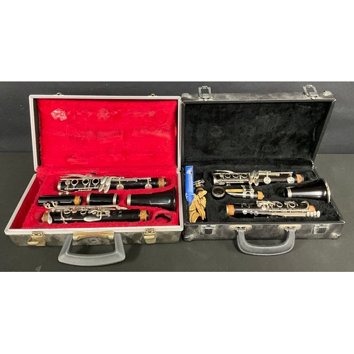 703 - A Noblet Artist clarinet, serial number B8196, cased; another, Boosey & Hawkes, cased (2)