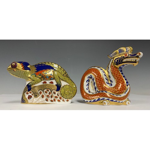 24 - A Royal Crown Derby paperweight, Chameleon, gold stopper; another, Dragon, gold stopper (2)