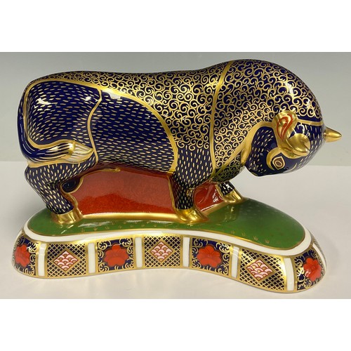 28 - A Royal Crown Derby paperweight, Grecian Bull, painted in the Imari palette, 19cm long, gold stopper... 