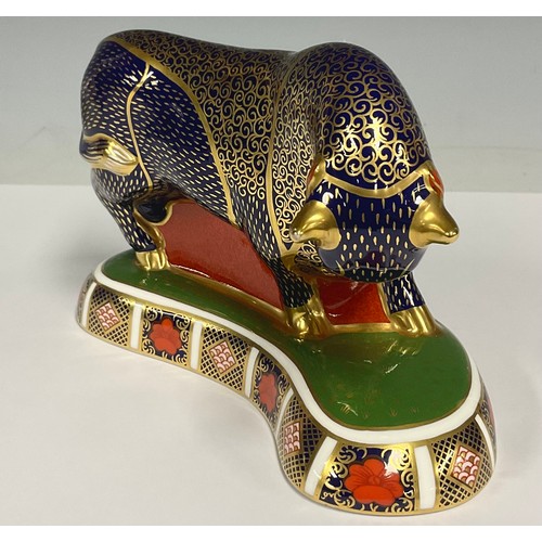 28 - A Royal Crown Derby paperweight, Grecian Bull, painted in the Imari palette, 19cm long, gold stopper... 