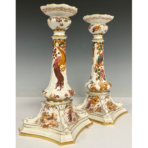 9 - A pair of Royal Crown Derby Olde Avesbury Castleton candlesticks, 27cm high, printed mark in red, da... 