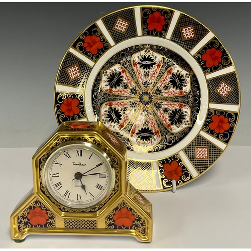 16 - A Royal Crown Derby 1128 old Imari mantel clock, Hanhart dial, 10cm x 13cm;  a 21.7cm diameter plate... 