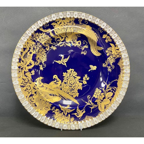 17 - A Royal Crown Derby Gold Aves circular charger, cobalt blue ground, heraldic border, 35.5cm diameter... 