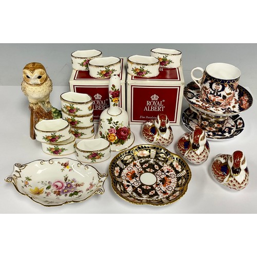 19 - Three Royal Crown Derby duck paperweights; Royal Albert Old Country Roses napkin rings and bell; a B... 