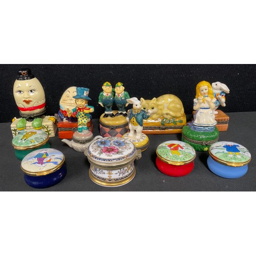 41 - A set of four Crummles enamel circular pill boxes, Rupert Characters, limited edition 202/1000; a co... 