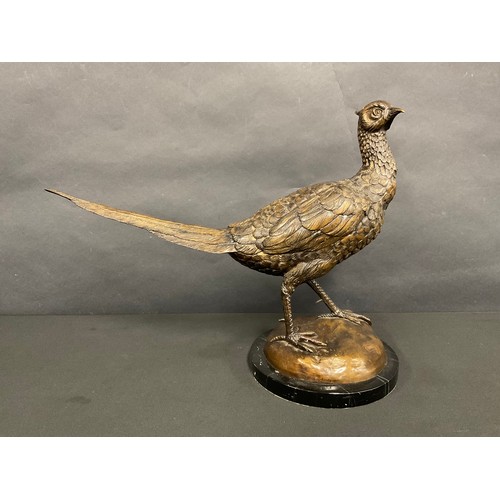 44 - A patinated bronze, of a Pheasant, circular marble base, 34cm high, 20th century