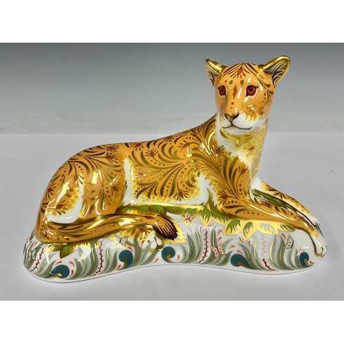 52 - A Royal Crown Derby paperweight, Lioness, 18cm wide, printed marks in red, date mark for 2008 (MMVII... 