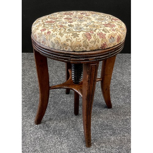 1921 - A Regency walnut rise-and-fall piano stool, 45cm high (lowest position) x 32.5cm diameter.