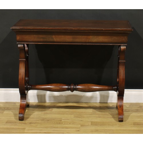 1679 - A Biedermeier mahogany centre table, rectangular top with moulded edge above a long frieze drawer, l... 