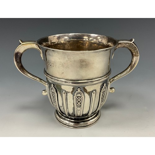 321 - A Victorian silver twin handled porringer, heavy gauge body relief decorated with geometric panels, ... 