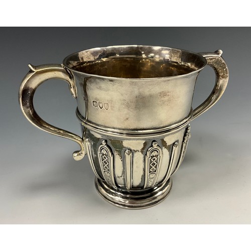 321 - A Victorian silver twin handled porringer, heavy gauge body relief decorated with geometric panels, ... 