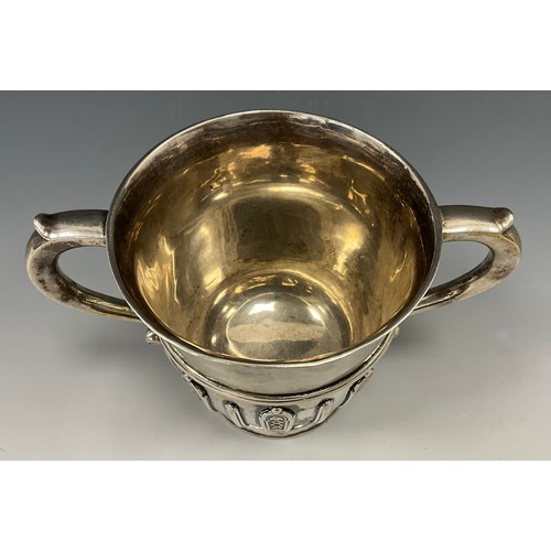 321 - A Victorian silver twin handled porringer, heavy gauge body relief decorated with geometric panels, ... 