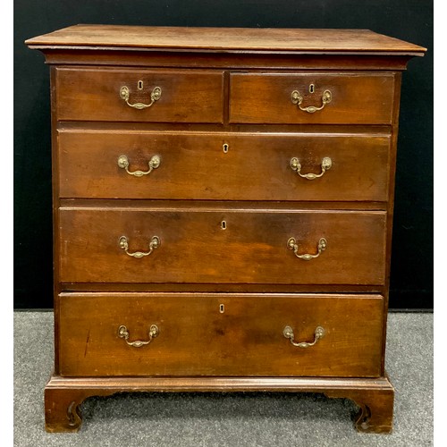 1776 - A George III oak chest of drawers, the over-sailing top with swept moulded edge, above two short, an... 