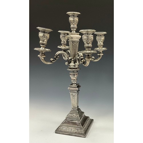 228 - A large Dutch 835 silver five-light two section candelabra, screw off top with embossed beaded and g... 