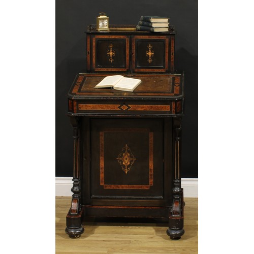 1614 - A Victorian amboyna, ebonised and marquetry music room Davenport desk, canted rectangular superstruc... 