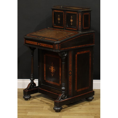 1614 - A Victorian amboyna, ebonised and marquetry music room Davenport desk, canted rectangular superstruc... 