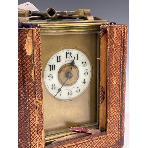 1980 - An early 20th century H Graves, Birmingham, carriage clock timepiece, shaped folding handle, 14.5cm ... 