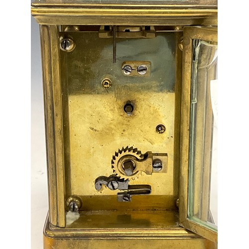 1980 - An early 20th century H Graves, Birmingham, carriage clock timepiece, shaped folding handle, 14.5cm ... 