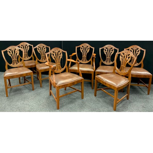 1923 - A set of eight Hepplewhite Revival dining chairs, shield-shaped backs with carved Fleur-de-lis and s... 