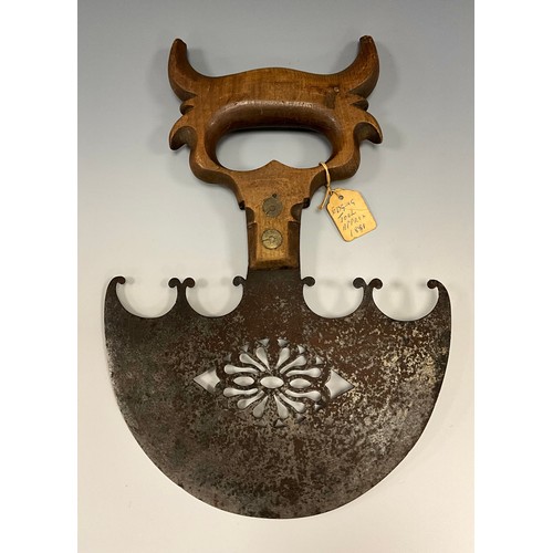 1799 - A 19th century Herb chopper or vegetable cutter, with pierced steel blade, saw handle, 27cm x 19cm