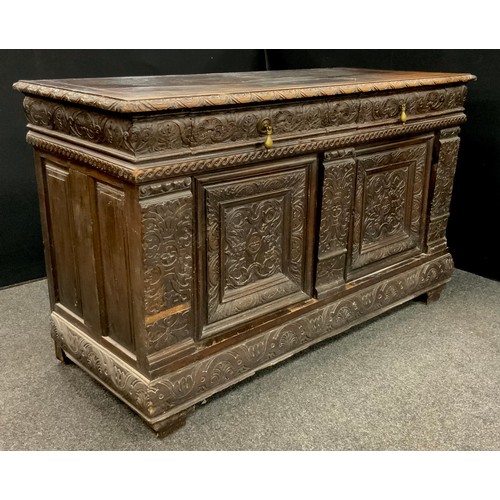 1621 - A Victorian Jacobean Revival carved oak sideboard, 96.5cm high, 156cm wide, 67cm deep