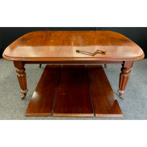 1696 - A Victorian mahogany extending dining table, 75cm high x 180cm long (296cm with additional three lea... 