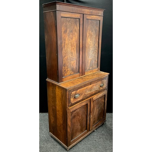 1606 - A George III mahogany secretaire bookcase, outswept cornice to top above a pair of well-figured maho... 