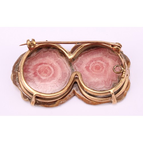 597 - A gold mounted polished rhodochrosite sliver two section brooch or pendant, unmarked yellow metal mo... 