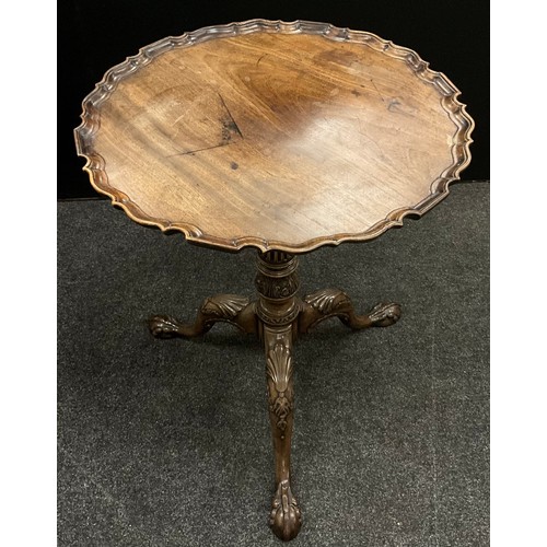 1688 - A George III Revival tilt-top bird-cage tripod table, the shaped top supported by a fluted, tapering... 