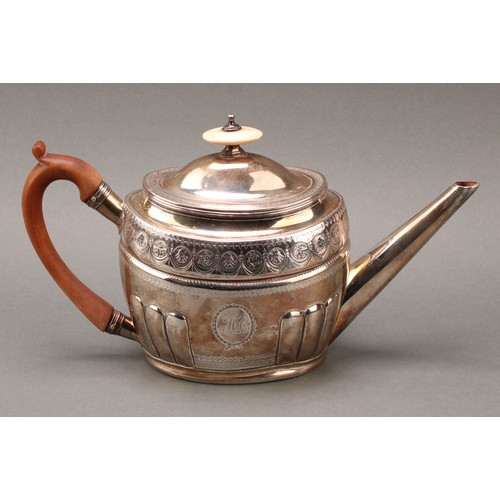 127 - A George III silver oval teapot, fluted angles, bright-cut engraved, 17cm high, John Robins, London ... 