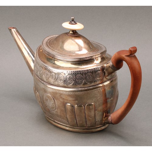 127 - A George III silver oval teapot, fluted angles, bright-cut engraved, 17cm high, John Robins, London ... 