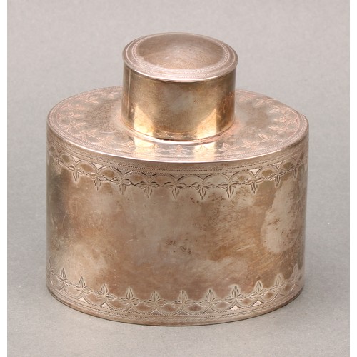 76 - A George III silver oval tea caddy, bright-cut engraved borders, push-fitting cover, 8.5cm high, Tho... 