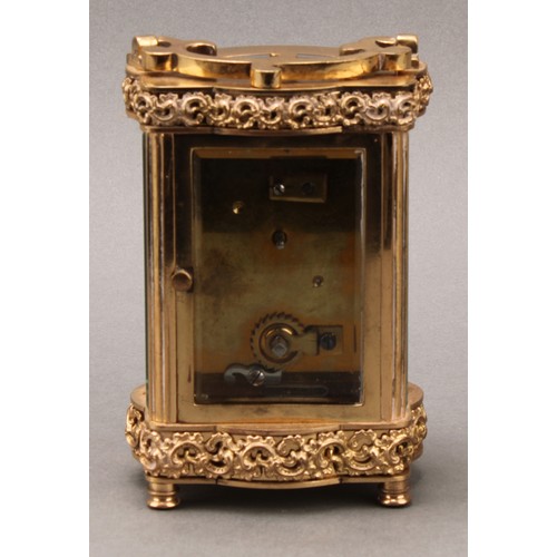 1976 - A late 19th century lacquered brass carriage timepiece, 5cm clock dial inscribed with Roman numerals... 