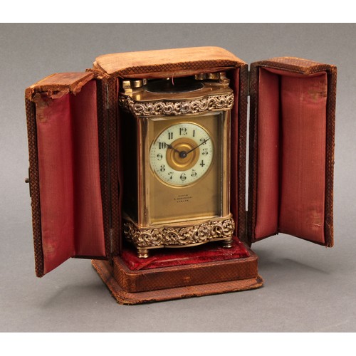 1976 - A late 19th century lacquered brass carriage timepiece, 5cm clock dial inscribed with Roman numerals... 