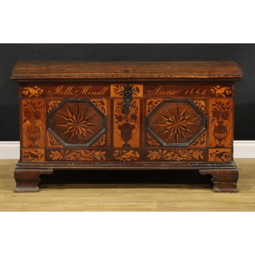 1525 - A 17th century German oak and marquetry chest, hinged domed cover enclosing a till and secret compar... 