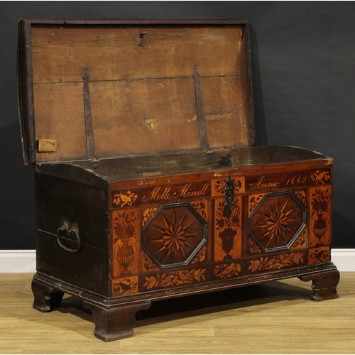 1525 - A 17th century German oak and marquetry chest, hinged domed cover enclosing a till and secret compar... 